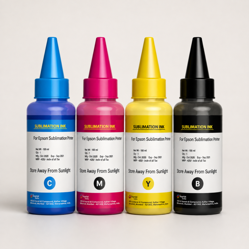 Quatre flacons d’encre de sublimation CMJN présentés sur un fond studio neutre